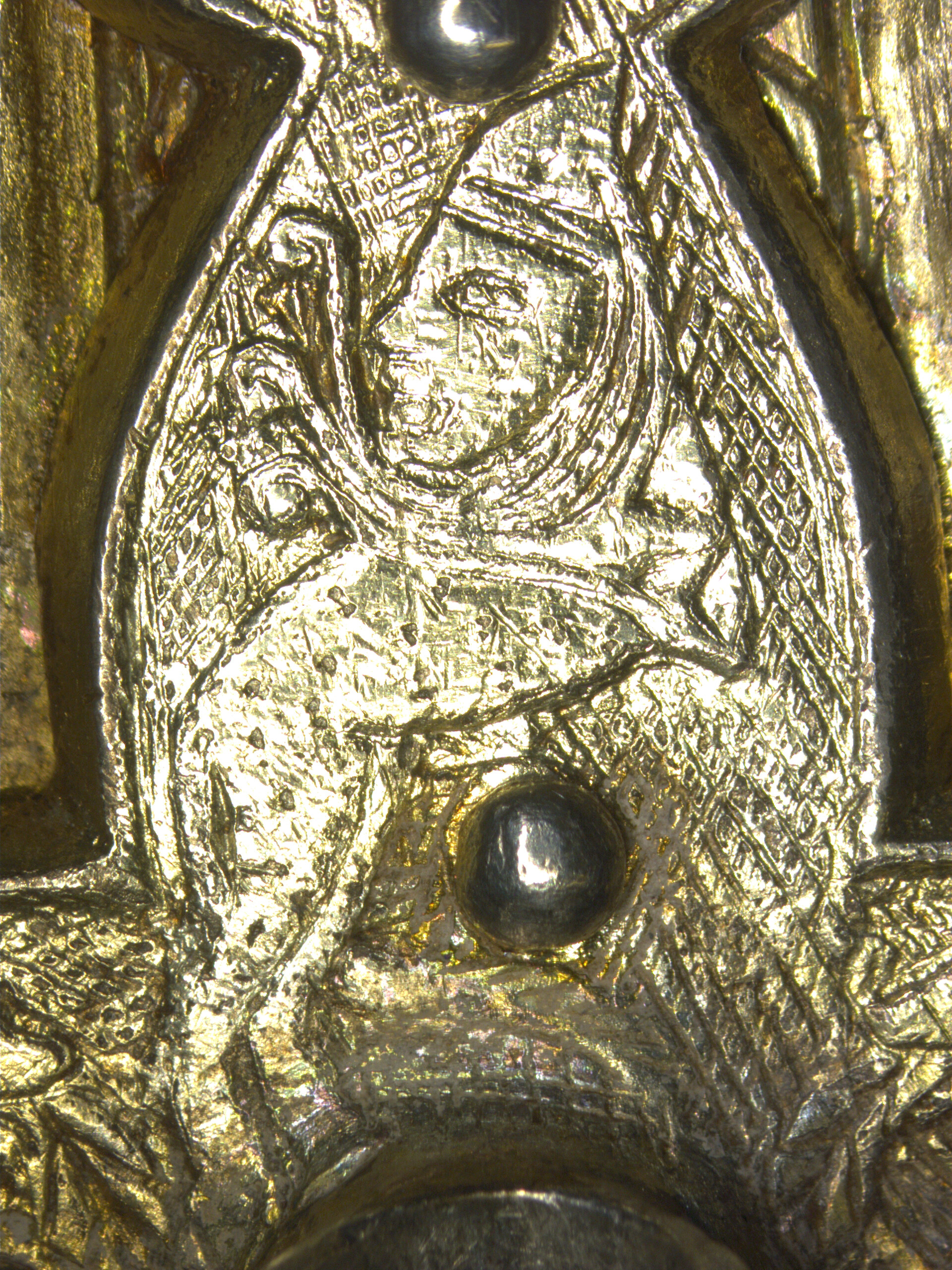 Detail of silver casket, fitting behind lion on closing peg: leopard sphinx, c. 1.5 cm high, the sole humanoid figure on the corpus.