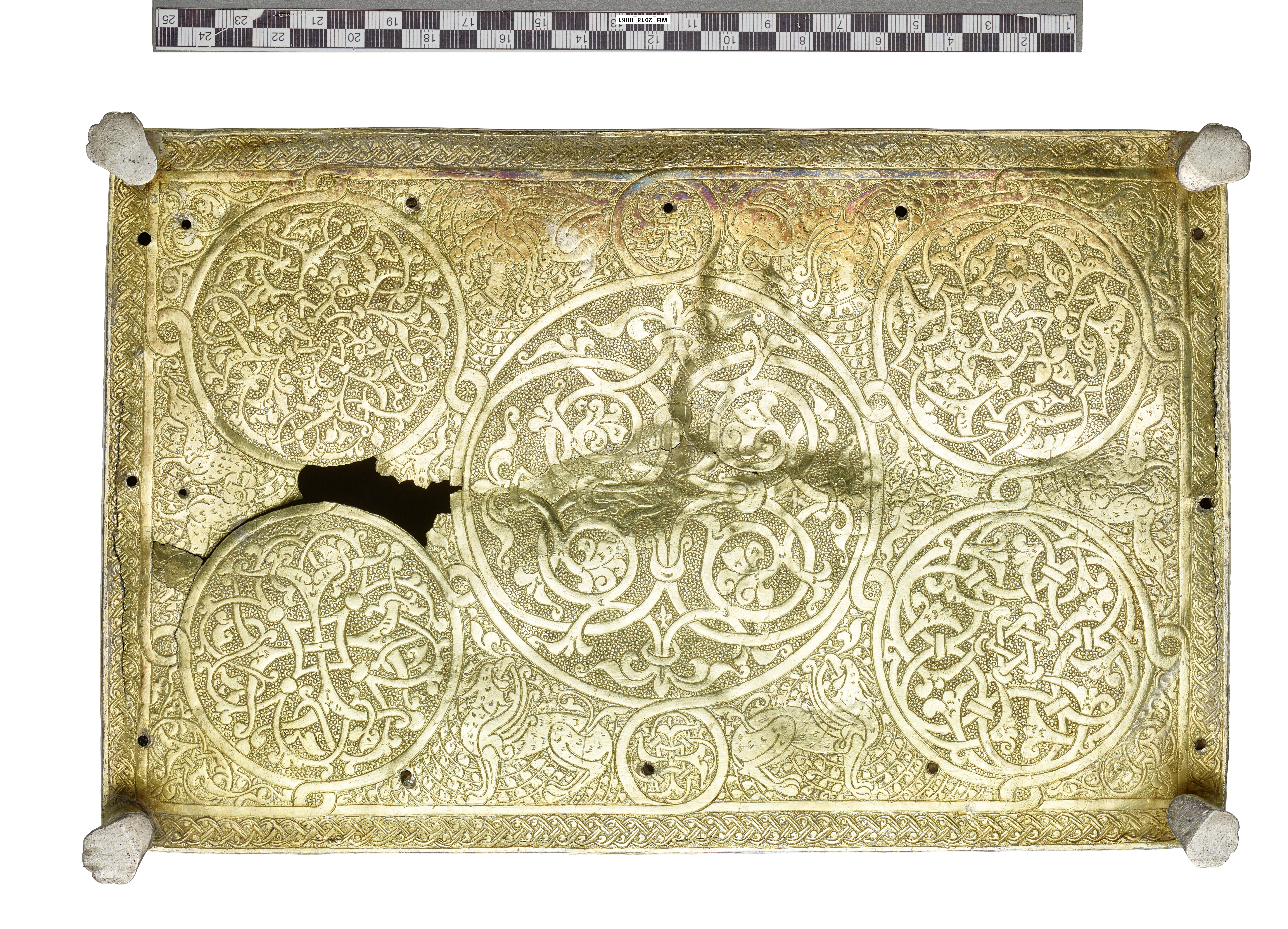Bottom plate of Trier silver casket with chased design. Five medallions, fabulous creatures and hares in spandrels.