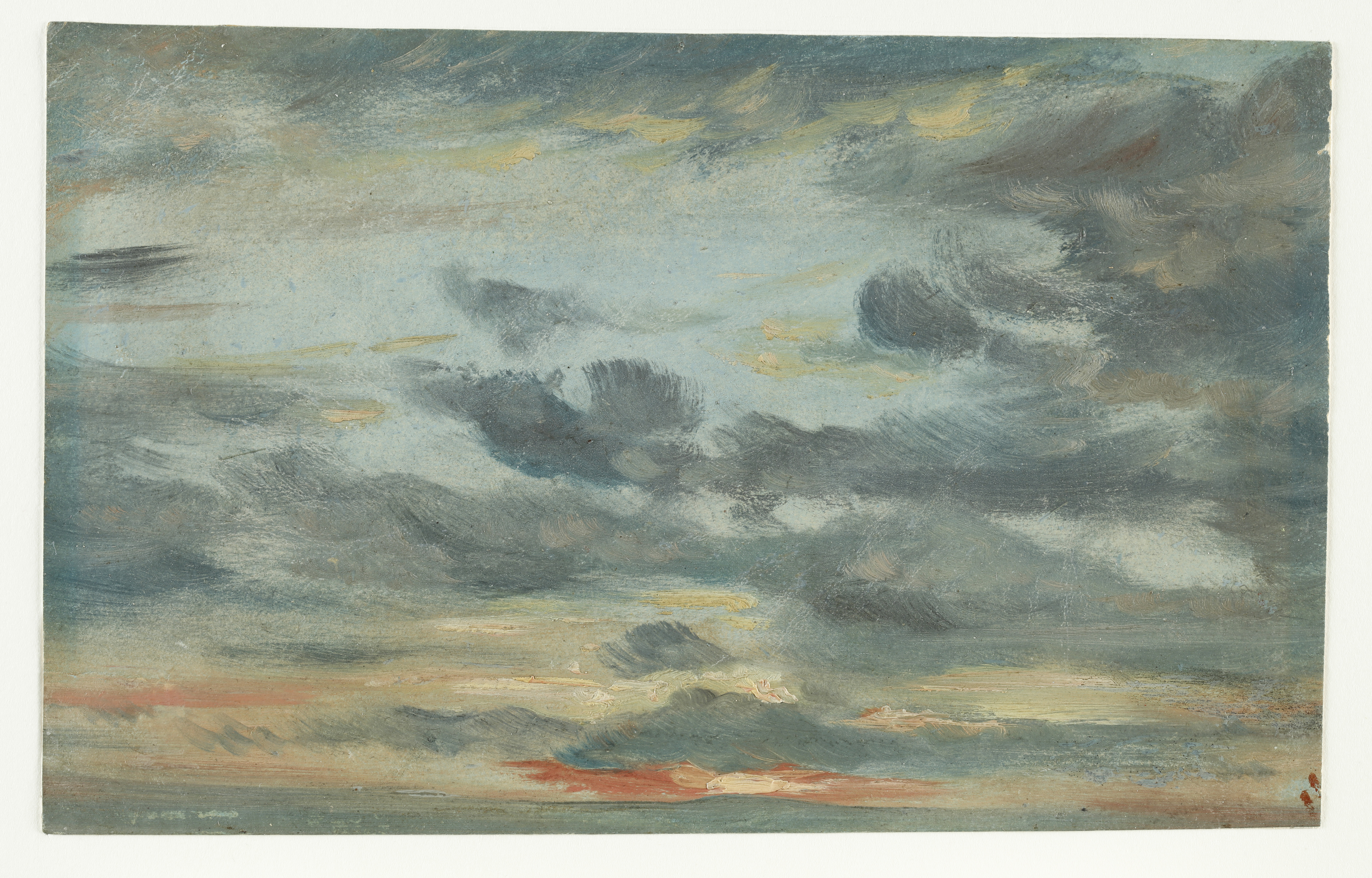 A sketch in oils on paper of a skyscape at sunset, with dark blue clouds and red-orange sunset over a pale blue background.
