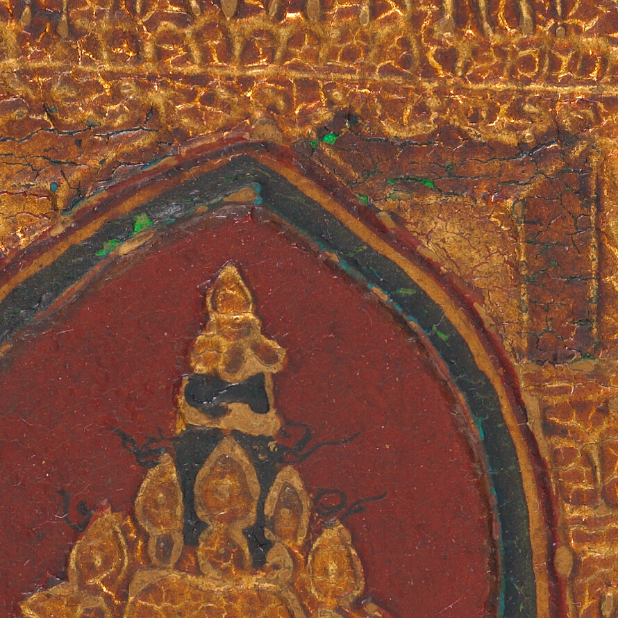 Detail of the surface of a panel showing green pigment visible through cracks in the gilding layer over the L-bracket design.