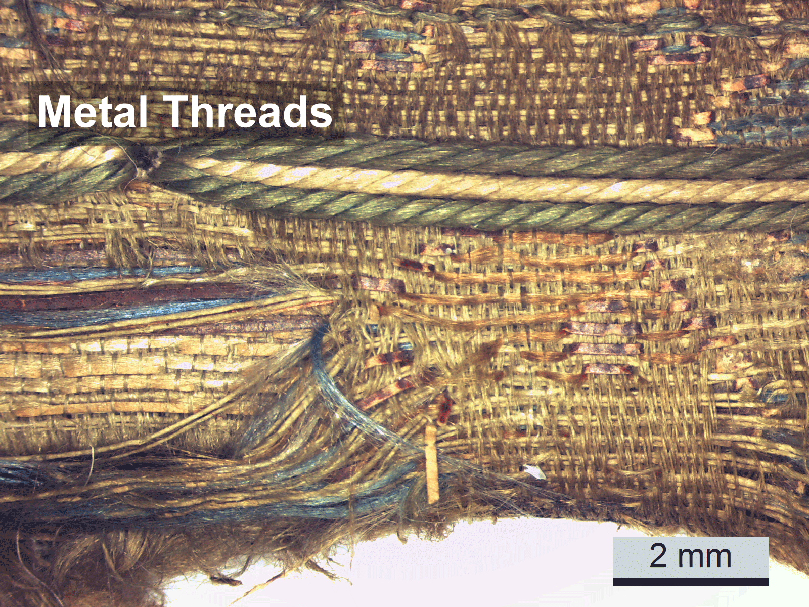 Magnified view of a complex weave pattern including paper wefts, which are highlighted in blinking red for emphasis