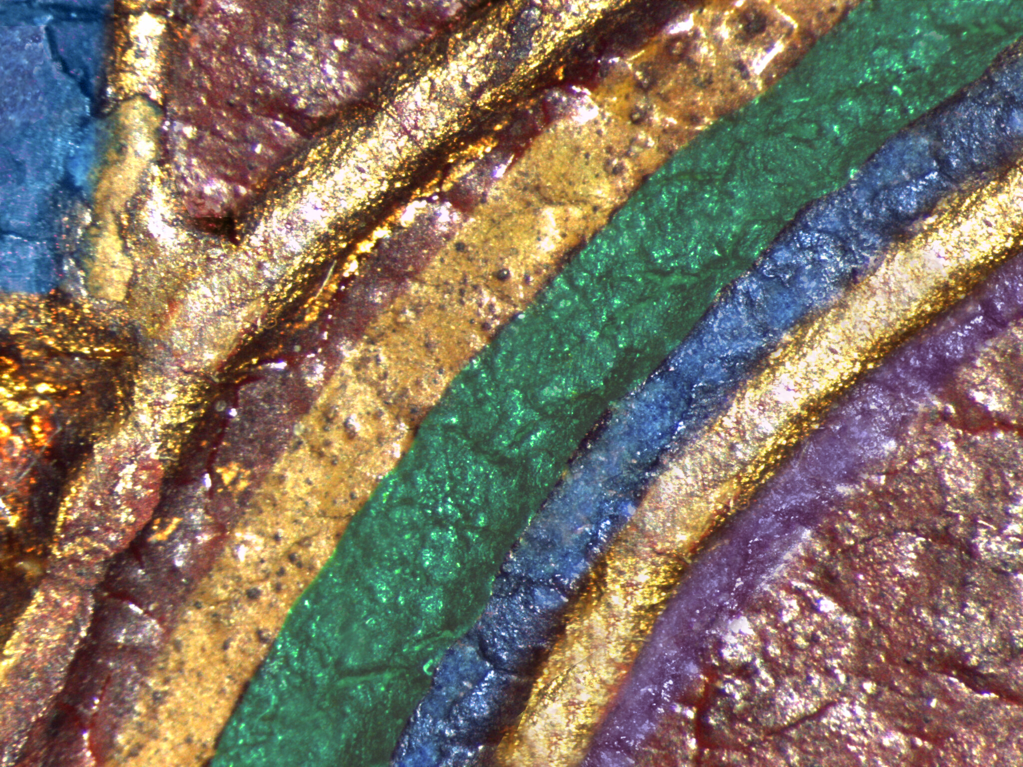 Detail of curved lines, left to right: gilded line, red, yellow, green, blue, gilded line, and purple, with red background.